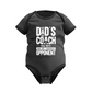 A black baby grow with the funny tennis slogan on the front that reads 'My Dads My Coach, My Hero And My Toughest Opponent'