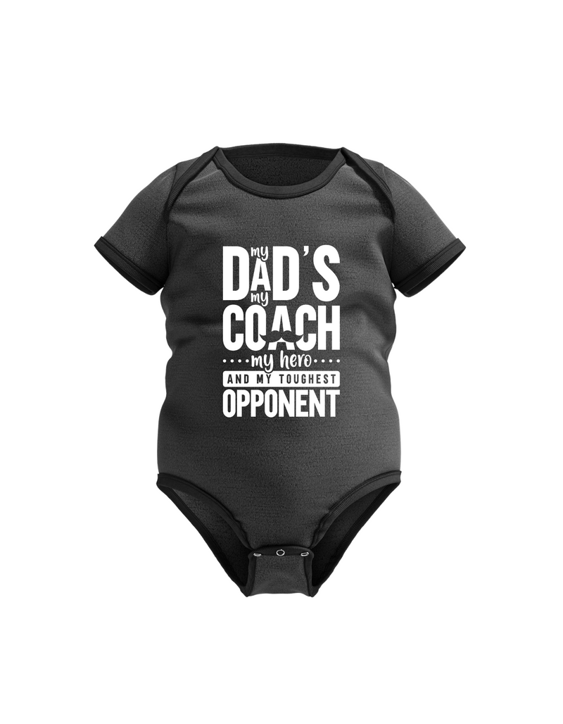 A black baby grow with the funny tennis slogan on the front that reads 'My Dads My Coach, My Hero And My Toughest Opponent'