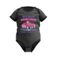 Black baby onesie with rugby-themed design and text on a white background, with '' My Mum Scrums Harder Than Your Dad! slogan on the front