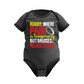 Black baby onesie with colorful text and rugby ball graphic on a white background with a Cows Corner slogan saying Rugby where pain is temporay but bruises are permanent