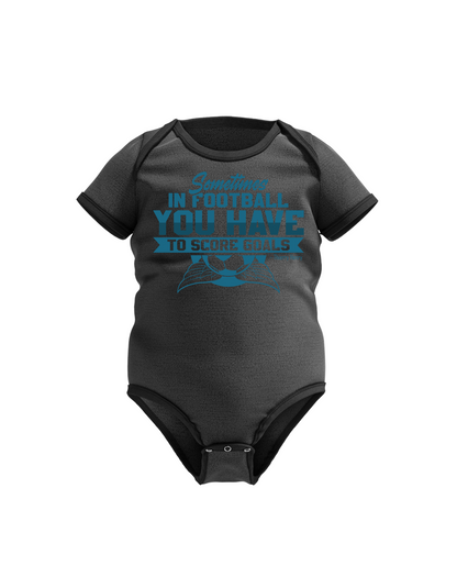Gray baby onesie with blue text on a white background with the Cows Corner slogan Sometimes in football you have to score goals - Theiry Henry