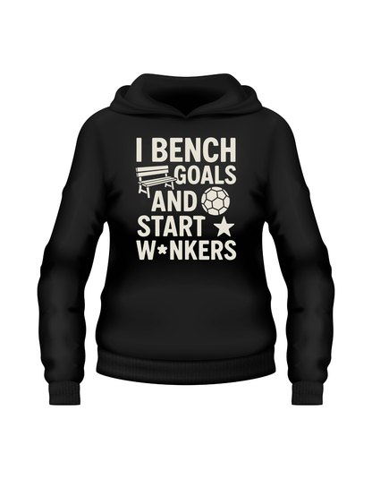 Black hoodie with white text and graphics on a white background - a Cows Corner hoodie with the funny fantasy football slogan on the front that reads 'I Bench Goals and Start W*nkers'. Cows Corner gifts are perfect for sport-mad fans, these gifts work brilliantly for birthdays, new baby celebrations, Father’s Day, Mother’s Day, Christmas, anniversaries, thank you gifts, end-of-season team awards, graduations, retirements, and just-because moments when you want to raise a smile. 