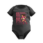 Black baby onesie with pink text and graphic on a white background, with the slogan on the front 'Raised by a Rugby Mum, Fearless for Life