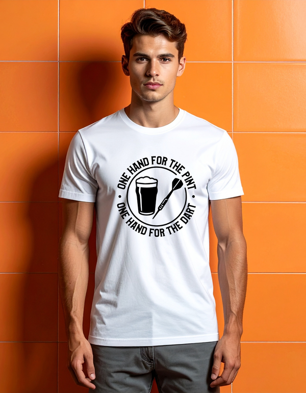 Man wearing a white t-shirt with a graphic design against an orange tiled wall with a Cows Corner slogan saying one hand for the pint one hand for the dart