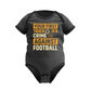 A black baby grow with the funny football slogan on the front that reads 'Your First Touch Is a Crime Against Football'