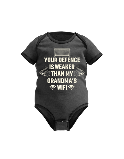 A black baby grow with the funny football slogan on the front that reads 'Your Defence Is Weaker Than My Grandma’s Wifi'