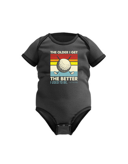 Black baby onesie with vintage golf graphic and text on a white background with a Cows Corner slogan saying The older I get, the better I used to be - Lee Trevino 