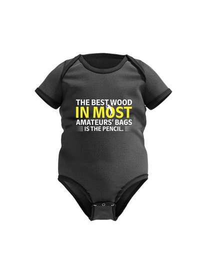 Black baby onesie with humorous text design on a white background with a Cows Corner slogan. The best wood in most amateurs' bags is the pencil.