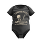 A black baby grow with the funny golf saying on the front that reads 'I Like Big Putts and I Cannot Lie, but Yours Are Embarrassing'