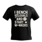 Black t-shirt with white text and graphics on a white background. A Cows Corner t-shirt with the funny fantasy football slogan on the front that reads 'I Bench Goals and Start W*nkers'.  Cows Corner gifts are perfect for sport-mad fans, these gifts work brilliantly for birthdays, new baby celebrations, Father’s Day, Mother’s Day, Christmas, anniversaries, thank you gifts, end-of-season team awards, graduations, retirements, and just-because moments when you want to raise a smile. 