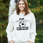 A lady wearing a white hoodie with the funny football slogan written on the front that reads 'Play Football Not Fortnite!