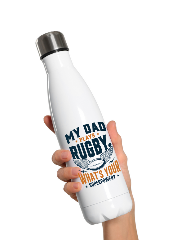 White water bottle with rugby-themed text held by a hand on a white background, with a slogan on the front saying 'My Dad Plays Rugby. What’s Your Superpower?