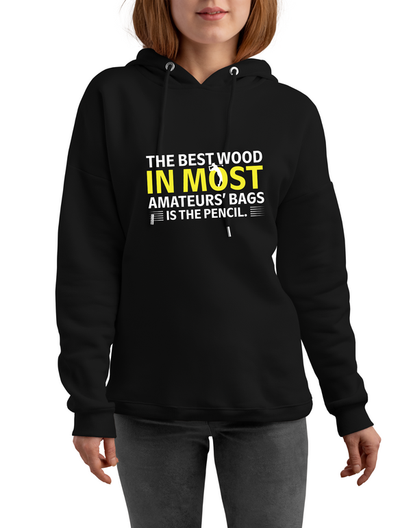 Black hoodie with humorous text design worn by a person on a white background with a Cows Corner slogan. The best wood in most amateurs' bags is the pencil.
