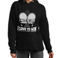 A lady wearing a black hoodie with 'I Hate To Lose More Than I Love To Win – Jimmy Connors' funny tennis slogan on the front