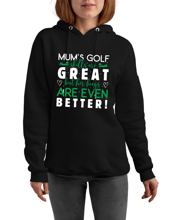 Black hoodie with humorous text design worn by a person on a white background with a Cows Corner slogan saying Mum's golf skills are great, but her hugs are even better.