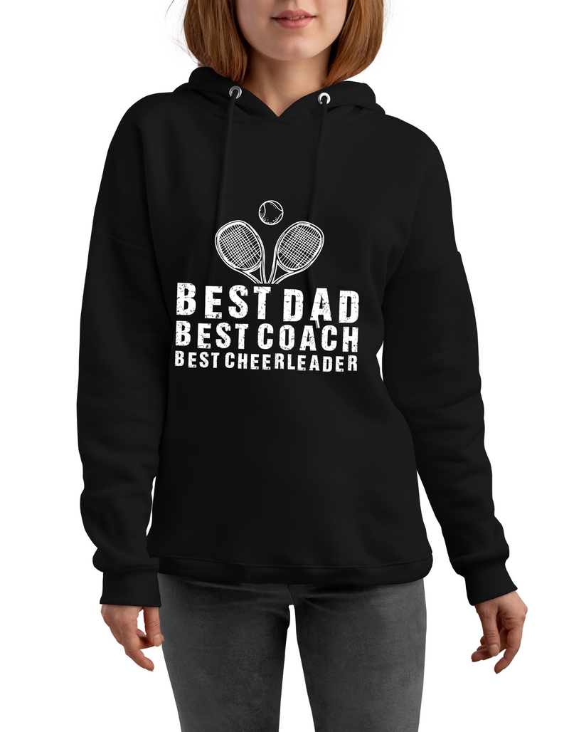 A lady wearing a black hoodie with the lovely tennis saying on the front that reads 'Best Dad, Best Coach, Best Cheerleader.'