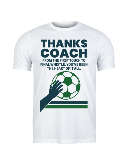 White t-shirt with soccer-themed design and text on a white background, with Cows Corner slogan saying Thanks Coach, from the first touch to final whistle, you've been the heart of it all