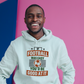 A man wearing a white hoodie with the funny football slogan on the front that reads 'If Football Was Easy You’d Be Good at It'