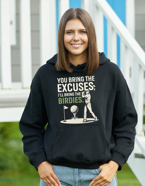 A black hoodie with the funny golf saying on the front that reads 'You Bring the Excuses, I’ll Bring the Birdies'