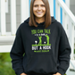 Woman wearing a black hoodie with a humorous graphic and text - You Can Talk to a Fade but a Hook Won’t Listen