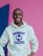 A man wearing a white hoodie with a funny football slogan on the front that reads 'Dribble You Can Barely Walk Straight!'