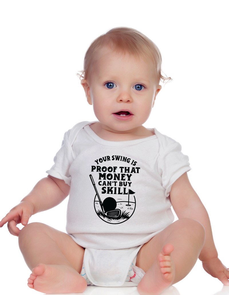 Baby wearing a white onesie with a humorous graphic and text.