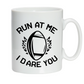 White mug with black text and rugby ball design on a white background with a Cows Corner slogan saying run at me I dare you