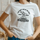 A white funny tennis t-shirt featuring the slogan on the front 'You Can’t Live in the Past, You’ve Got To Keep Looking Forward and Pressing On – Pete Sampras'