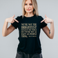 Lady wearing a black t-shirt with the slogan on the front 'We’re Not the Brightest Bunch in the World, but We’re Not As Daft as People Think – Brian O’Driscoll