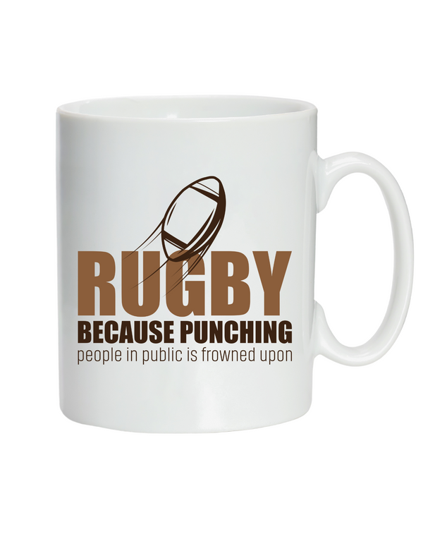 White mug with rugby-themed text and graphics on a white background with a Cows Corner slogan saying Rugby because punching people in public is frowned upon