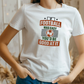 A lady wearing a white T-shirt with the funny football slogan on the front that reads 'If Football Was Easy You’d Be Good at It'