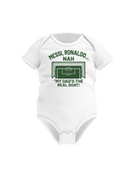 A white baby grow with the funny football and dad loving slogan on the front which reads 'Messi, Ronaldo…Nah ’My Dads the Real Goat!'