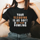 A lady wearing a black t-shirt with Your Sledging Is As Soft As Your Bowling on the front. A Funny Cricket T-Shirt, Premium Fabric, Multiple Adult Sizes
