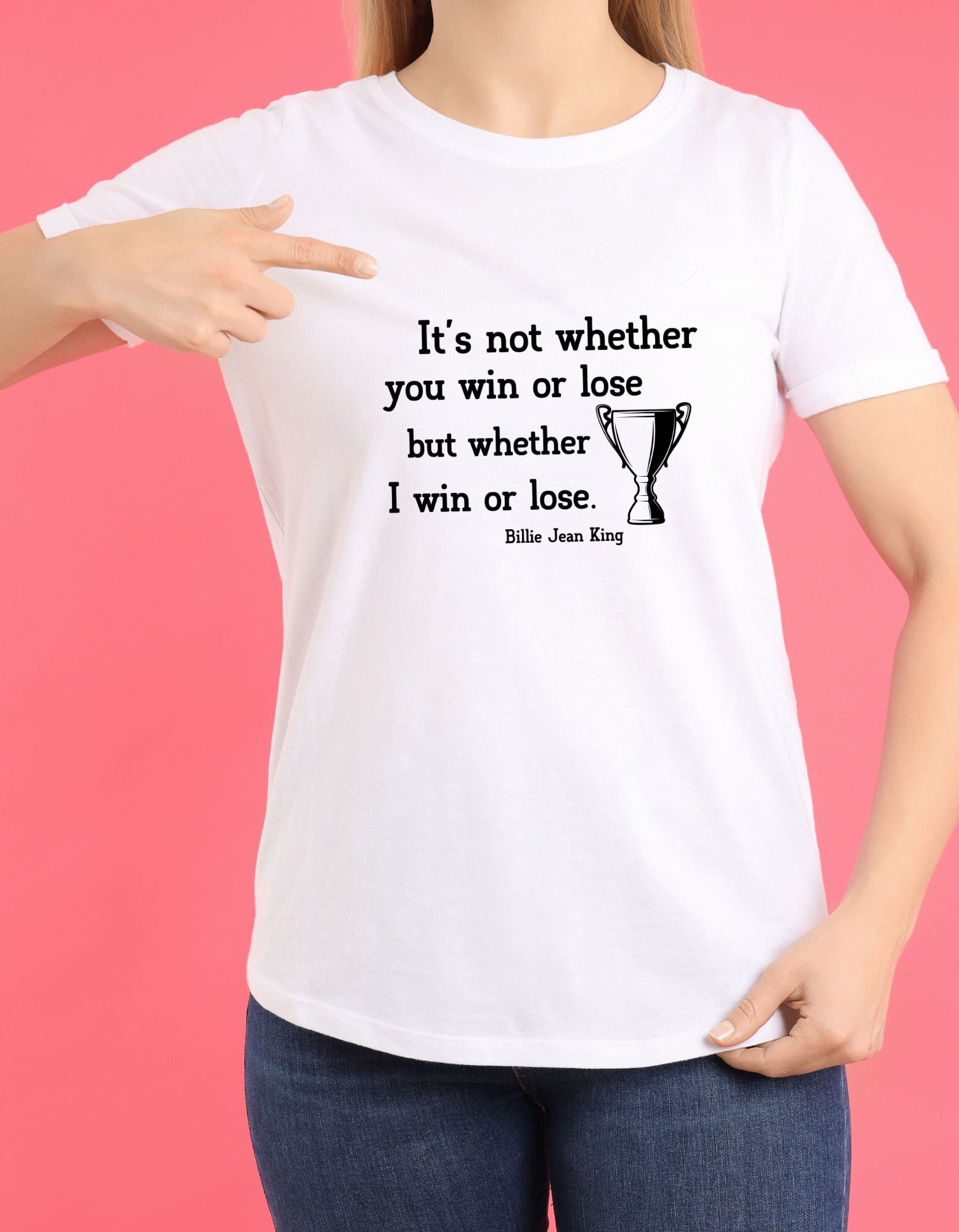 A lady wearing a white t-shirt with the funny tennis slogan on the front reading 'It’s Not Whether You Win or Lose but Whether I Win or Lose – Billie Jean-King!