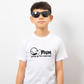 A boy wearing a white t-shirt with tennis slogan on the front that reads 'Mum Serves Up Love and Aces'.