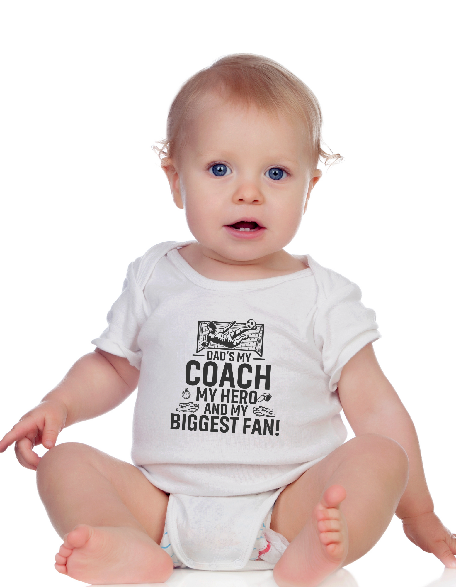 A little baby wearing a white baby grow with the funny football slogan on the front saying 'Messi, Ronaldo…Nah ’My Dads the Real Goat!