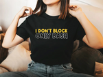 A lady wearing a black t-shirt with I Don't Block, Only Bash on the front. 
 A Funny Cricket Tee, Premium Fabric, Multiple Adult Sizes