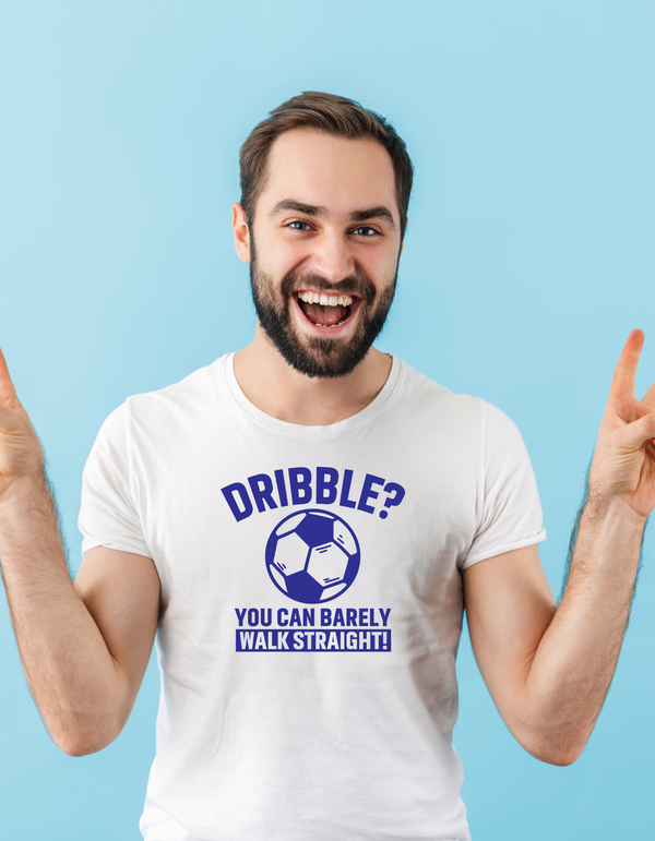 A man wearing a white t-shirt with a funny football slogan on the front that reads 'Dribble You Can Barely Walk Straight!'