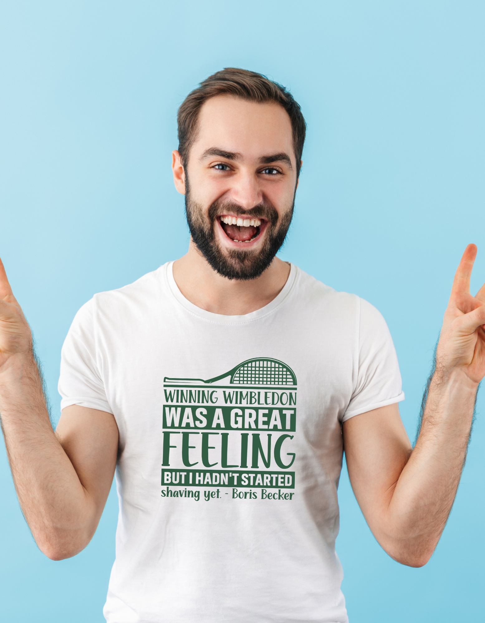A man wearing a white T-shirt with a funny tennis slogan on the front saying 'Winning Wimbledon Was a Great Feeling, but I Hadn’t Started Shaving Yet – Boris Becker'
