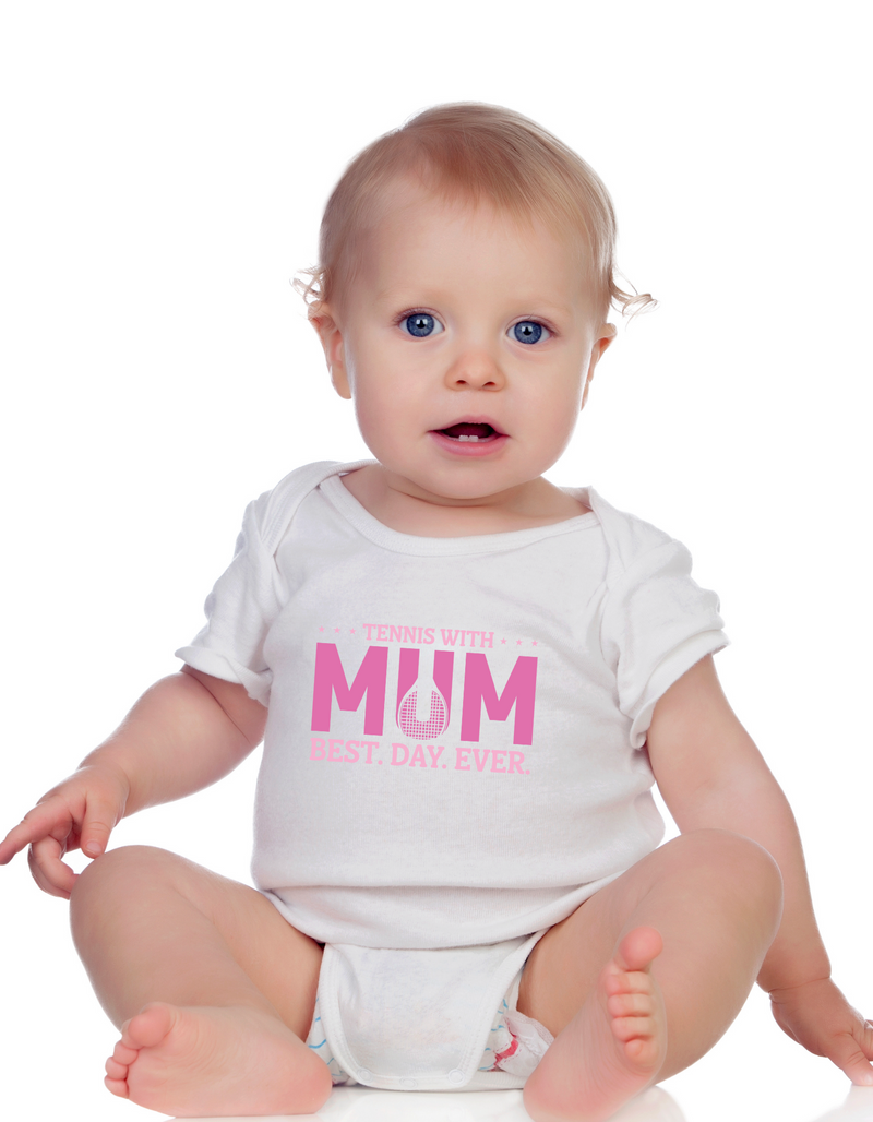 A a baby wearing white baby grow with a lovely tennis saying on the front that reads 'Tennis with Mums. Best. Day. Ever!'