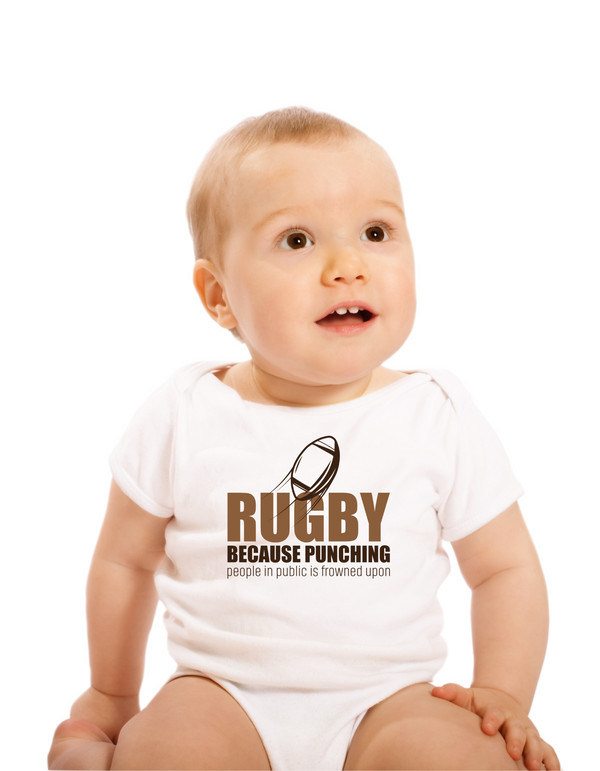 Baby wearing a white onesie with rugby-themed text on a white background with a Cows Corner slogan saying Rugby because punching people in public is frowned upon