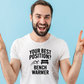 A man wearing a white t-shirt that has the funny football slogan on the front that reads 'Your Best Position? Bench Warmer'