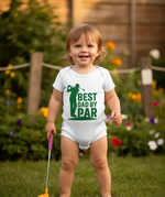 Child wearing a Cows Corner baby grow with the funny golf slogan 'Best Dad by Par'. Cows Corner gifts are perfect for sport-mad fans, these gifts work brilliantly for birthdays, new baby celebrations, Father’s Day, Mother’s Day, Christmas, anniversaries, thank you gifts, end-of-season team awards, graduations, retirements, and just-because moments when you want to raise a smile. 
