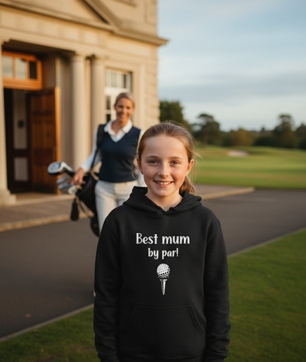 Girl wearing a Cows Corner hoodie with the funny golf slogan on the front 'Best Mum by Par'. Cows Corner gifts are perfect for sport-mad fans, these gifts work brilliantly for birthdays, new baby celebrations, Father’s Day, Mother’s Day, Christmas, anniversaries, thank you gifts, end-of-season team awards, graduations, retirements, and just-because moments when you want to raise a smile. 
