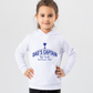 A little girl wearing a white hoodie with Dad's Captain, But I'm The Real Decision-Maker on the front. A Funny Cricket Hoodie, Premium Fabric, Multiple Junior Sizes, Perfect for Boys and Girls