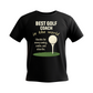 A black t-shirt with the funny golf saying on the front that reads 'Best Golf Coach in the World. Thanks for Every Swing, Smile and Slice Fix'