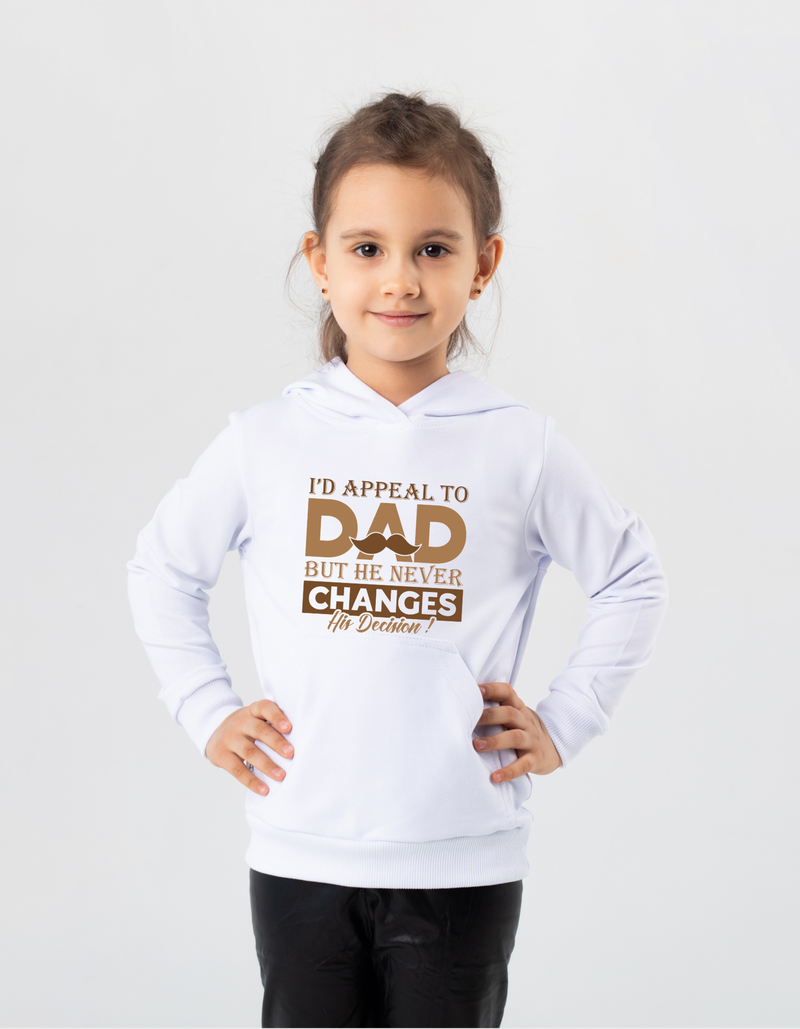 A little girl wearing a white hoodie with I'd Appeal To Dad, But He Never Changes His Decision on the front.       A Funny Cricket Hoodie, Premium Fabric, Multiple Junior Sizes, Perfect for Boys and Girls