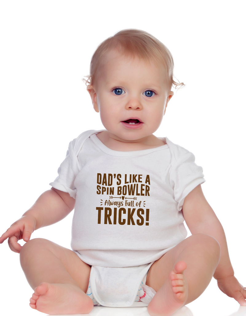 A baby wearing a baby grow with Dads Like a Spin Bowler, Always Full of Tricks, on the front! Funny Cricket Baby Bodysuit, Organic or In-Conversion to Organic Cotton, Self Fabric Bound Neckline, Cuffs and Leg Openings