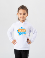 A little girl wearing a white hoodie with Dad Is a Great Fielder, Always Catching Me Out on the front.  A Funny Cricket Hoodie, Premium Fabric, Multiple Junior Sizes, Perfect for Boys and Girls