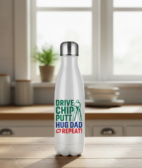 White water bottle with text design on a kitchen counter. This is a Cows Corner water bottle with a funny golf slogan 'Drive Chip Putt Hug Dad Repeat!'. Cows Corner gifts are perfect for sport-mad fans, these gifts work brilliantly for birthdays, new baby celebrations, Father’s Day, Mother’s Day, Christmas, anniversaries, thank you gifts, end-of-season team awards, graduations, retirements, and just-because moments when you want to raise a smile. 
